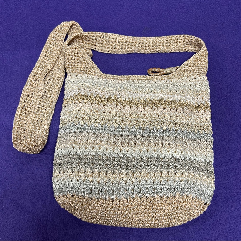 The SAK vintage crossbody neutral shaded crochet style design
